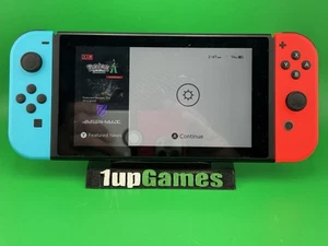 LESEN Nintendo Switch mit Neon Blau und Neon Rot Joy-Con T40 - Bild 1 von 7