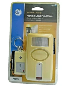 GE Personal Security Motion Sensing Alarm with Keychain Remote Activation Creme - Picture 1 of 4