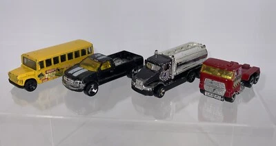 Lote de 4 camiones Hot Wheels. Camión de volteo 88-Acid Rock, 97-F-150, 91-Tanker, 81  Foto 1 de 4