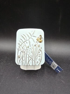 NUEVO DIFUSOR DE FRAGANCIA YANKEE CANDLE SCENTPLUG - Flor en relieve azul  Foto 1 de 3