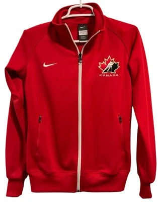 Nike Mujer Talla S/M Equipo Canadá Hockey Cremallera Completa Rojo Cremallera Bolsillos Chaqueta de Pista Foto 1 de 4