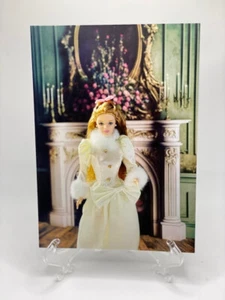 Brand New Barbie Standing In Front of a Fireplace Postcard/Art Print - Picture 1 of 3