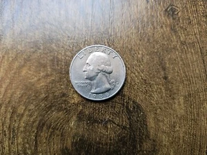 1986 D Quarter Circulated-Error "I" Partial Cut - Picture 1 of 2