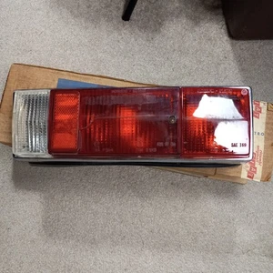 FIAT 124 SPIDER 1973-1978 ORIGINAL ALTISSIMO LEFT TAIL LIGHT LENS NEW OLD STOCK - Picture 1 of 13