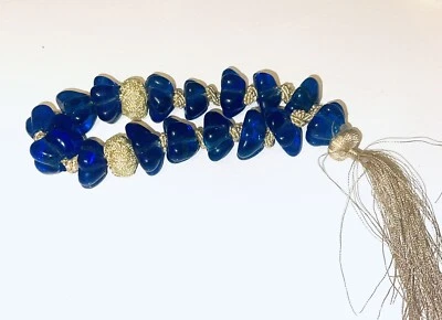 "Juego de 16 cuentas de vidrio azul cobalto de Murano con forma de flor grande cordón de borla dorada" Foto 1 de 3