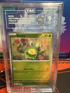 Budew (Master Ball Pattern) 004/131 Prismatic Evolutions Holo TAG 9 - Picture 1 of 2