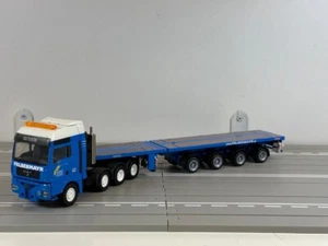 CONRAD Truck models, MAN TGA 8X4 Nooteboom Telestep Trailer 4 Axle, FELBERMAYR - Picture 1 of 14
