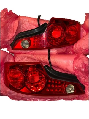 Juego de pares de luces traseras izquierda y derecha Infiniti G35 Coupé 2003-2005 OEM 26550AM825 Foto 1 de 4