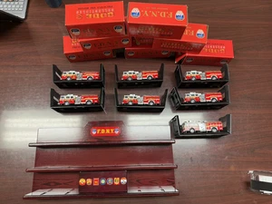 Code 3 Model #1358 & #12651-12657 FDNY Squad Seagrave Pumpers x7 & Display Case - Picture 1 of 11