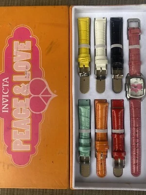 Reloj Analógico Invicta Damas Banda Multicolor Paz y Amor Lupah Modelo 19840 Foto 1 de 4