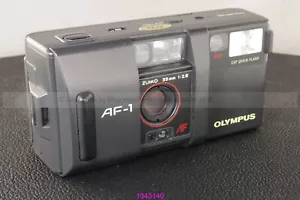 OLYMPUS AF-1 + LENTE ZUIKO PRIME 35mm 1:2.8 (1343140) - Imagen 1 de 13