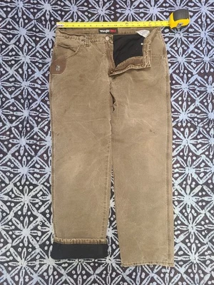 Calça de lona Wrangler Riggs forrada de lã marrom escuro cintura 35 - Imagem 1 de 4