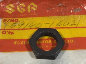 NEW OEM SUZUKI 09140-16021 NUT,PINION - Foto 1 di 1