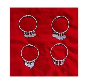 Künstliche 4er Set Armbänder Damen oxidiert poliert, mit Charms - Bild 1 von 7