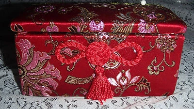 BEAUTIFUL LITTLE  RED FABRIC CUSHIONED TREASURE TRUNK - Image 1 of 4