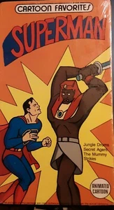 SUPERMAN - CARTOON FAVORITES (VHS) Jungle Drums, Secret Agent, The Mummy Strikes - Foto 1 di 2