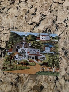 Charles Wysocki BUDZEN’S MARKET Print Tin Sign 1974 Wall Decor 8x6 1/2” VTG - Picture 1 of 2