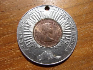 INCASED 1953 CANADA GOOD LUCK CENT DOLLAR SIZE. - Picture 1 of 2
