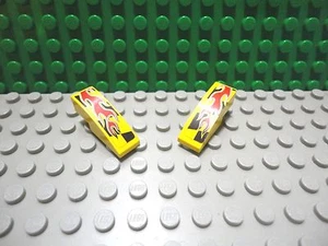 Lego 2 Yellow 3x1 sloped brick block with sticker of flames  - Picture 1 of 1