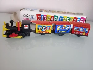 Giocattolo in latta e plastica trenino zigzag express carica  manuale - Picture 1 of 1