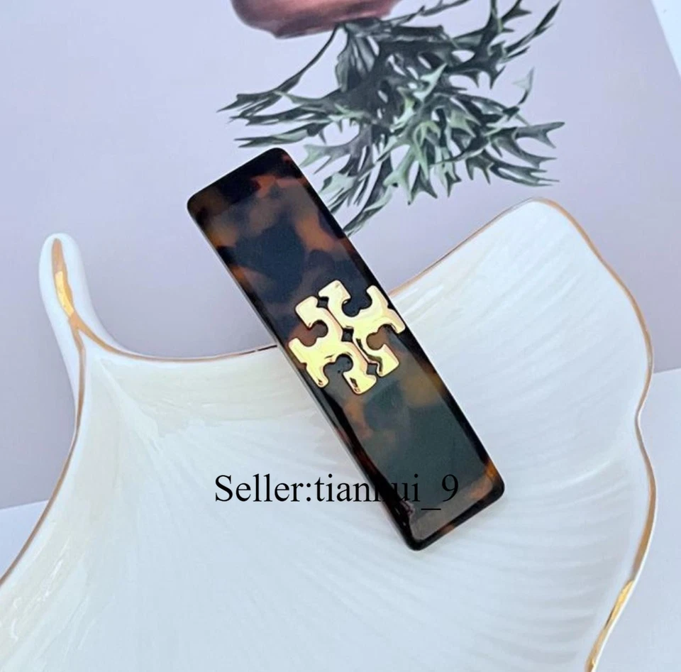 ¡Nuevo! Pinza de pelo Tory en marrón con bolsa para joyas Foto 1 de 4