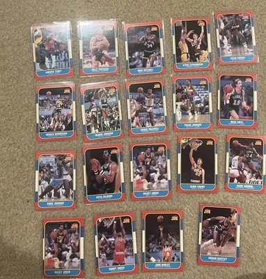 Lote de 19 tarjetas diferentes de baloncesto Fleer 1986 sin clasificar - sin duplicados Foto 1 de 2
