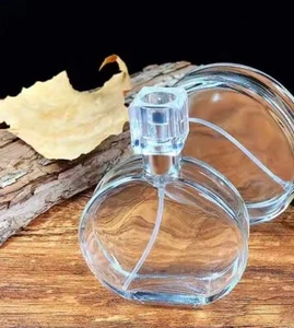 50ml Empty Glass Perfume Spray Bottles Round Clear Gold or Silver Screw off Pump - Picture 1 of 10