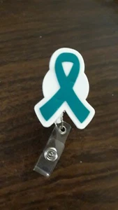 ๐ Porta Badge Consapevolezza Nevralgia del Trigemino Nastro Teal Consapevolezza (A10 - Foto 1 di 2