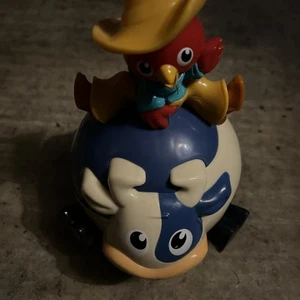 Bright Starts Baby Spielzeug Rolling Bull Riding Cowboy Huhn Musik - Bild 1 von 5