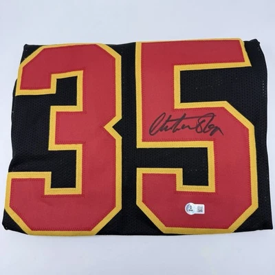 Camiseta de fútbol americano Beckett firmada por Christian Okoye personalizada de los Kansas City Chiefs certificado de autenticidad Foto 1 de 4