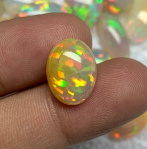4,10 Karat seltener natürlicher gelber Feueropal, Regenbogenfeuer eithiopischer Opal Cabochon - Bild 1 von 5