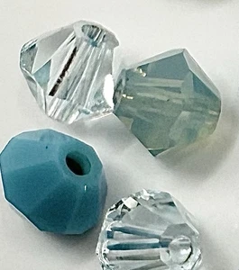 50 pieces Genuine Swarovski Crystal 4mm Bicone Beads (mixed blue shades) - Picture 1 of 3