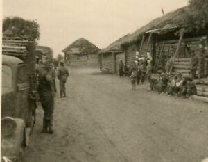 Face Off - Russian Children + German Soldiers on Each Side of Village Road Photo