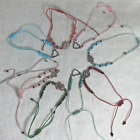 Lot of String Bracelets in Multiple Colors With Charms