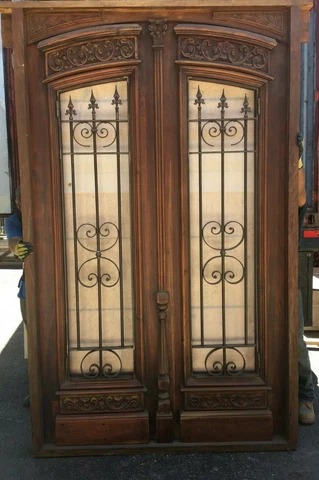Antique double front door with wrought iron inserts Cover