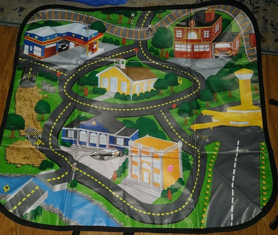 Contenedor con cremallera calle alfombrilla 25" X 22" juego niños sin marca con 20 autos Hot Wheels Foto 1 de 4