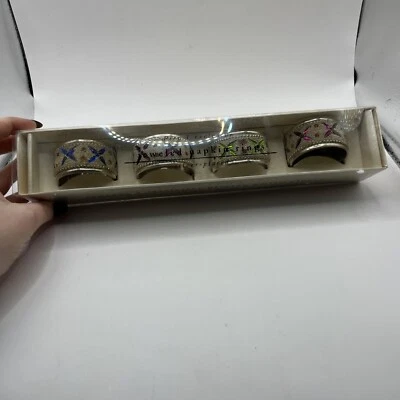 Juego de 4 servilleteros exclusivos enchapados en plata Pier 1 Foto 1 de 4