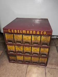 Espositore negozio ricambi pubblicitari vintage anni 50 60 E. Edelmann (12"x12"x12") - Foto 1 di 6