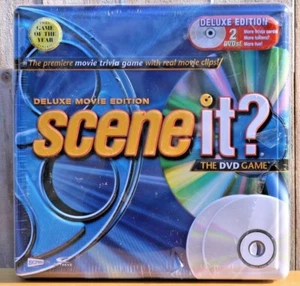 SCENE IT DELUXE MOVIE EDITION THE DVD BOARD GAME TIN STEEL BOOK FACTORY SEALED - Picture 1 of 3