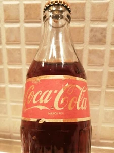 Bevi la vera COCA-COLA VINTAGE ANNI 80 "ancora piena" Sigillata tappo originale - Foto 1 di 11