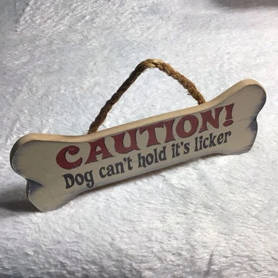 Letrero de bienvenida para perros hecho a mano con forma de hueso con hangar de cuerda Foto 1 de 4