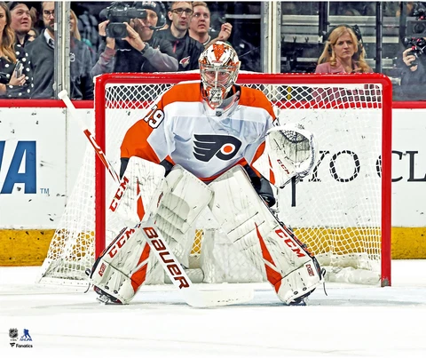 Carter Hart Philadelphia Flyers Unsigned White Jersey in Net Photograph Cover