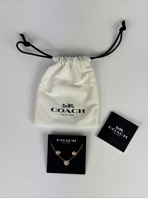 Juego de collar y aretes Coach círculo abierto de oro rosa rosa rosa  Foto 1 de 4