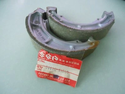 Nuevo juego de zapatas de freno OEM Suzuki 1979 1981 PE175 DOBLE PROPÓSITO # 54410-41500 Foto 1 de 4