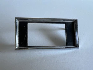 Ford Galaxie 1963 tablero de reloj bisel cromado placa frontal con acabado negro original OEM - Imagen 1 de 8