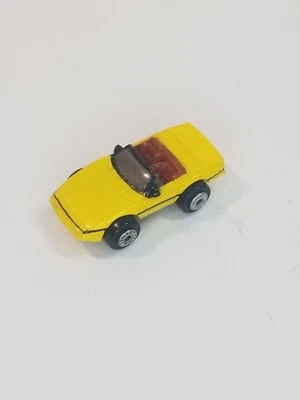 Small Micro Machine 1980's Chevy Corvette Convertible in Yellow - Image 1 of 4
