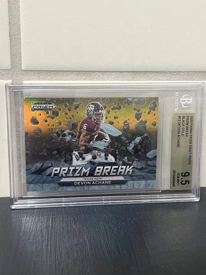 De'Von Achane 2023 Panini Prizm Draft Picks Prizm Break Black Gold #12 #1/5 RC - Image 1 of 3