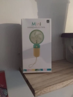 Mini Ventilador Portátil USB Recargable Color Naranja Foto 1 de 4