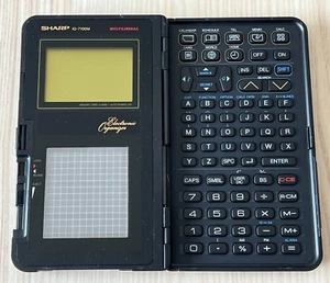 Vintage ELECTRONIC ORGANIZER SHARP IQ-7100 Multilingual Made in JAPON 9501954Y - Photo 1/23