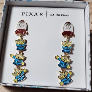 Nuovi orecchini pendenti BaubleBar Pixar Disney Toy Story Alien con nave razzo nuovi con scatola - Foto 1 di 3